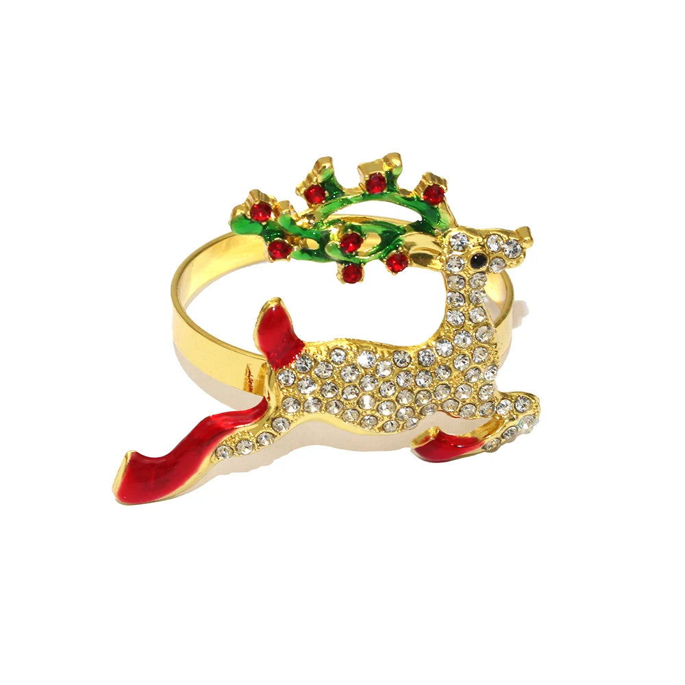 Gold reindeer-shaped bracelet with red and green accents on a white background