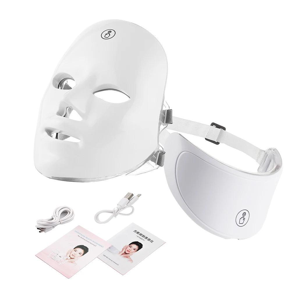 White LED face and eye mask with cables and user manual on a white background