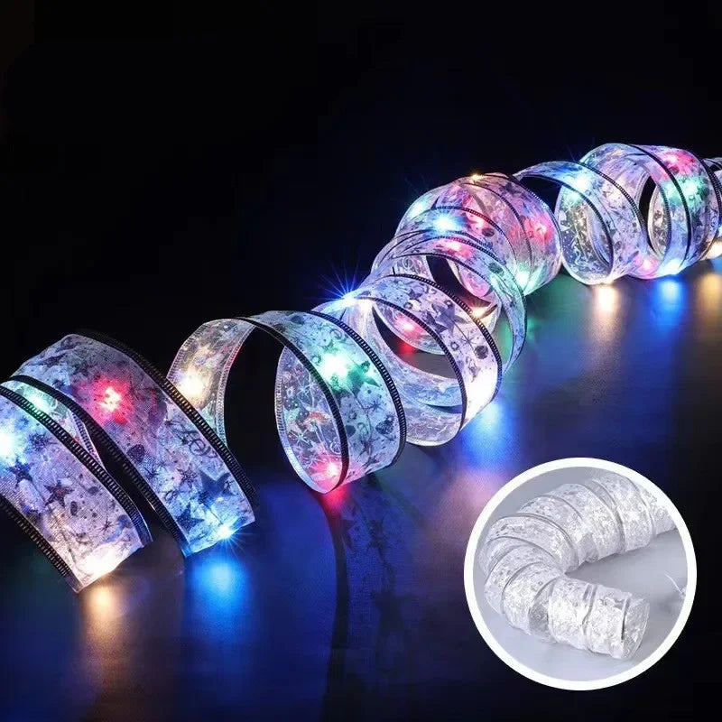 Colorful LED ribbon with light-up design on a dark background