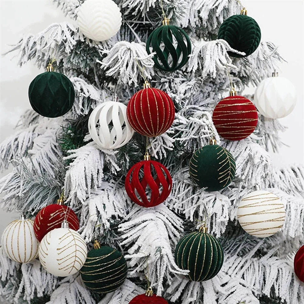 Decorative Christmas ornaments on a snow-frosted tree