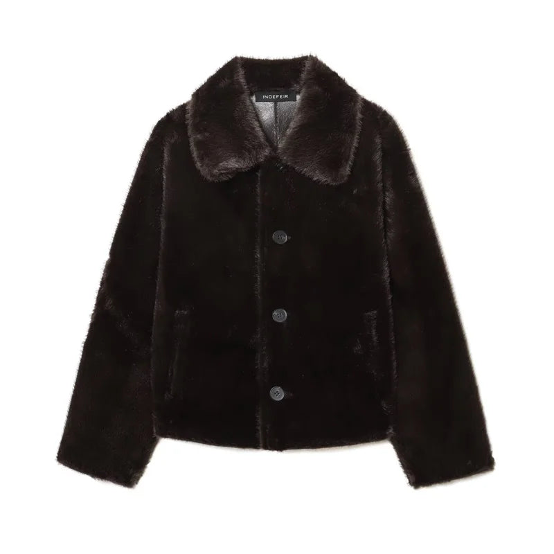 Black faux fur jacket with a collar on a white background