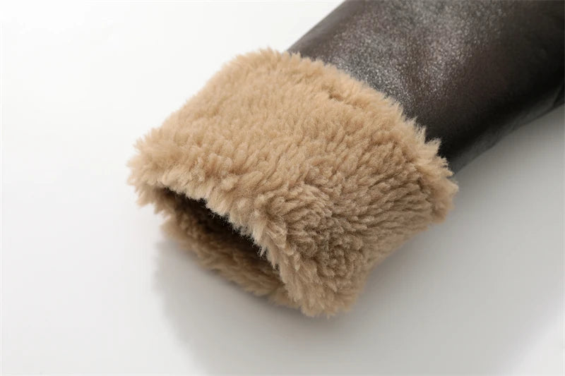Close-up of a brown leather boot with beige fur lining on a white background