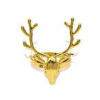 Gold deer head ring on a white background