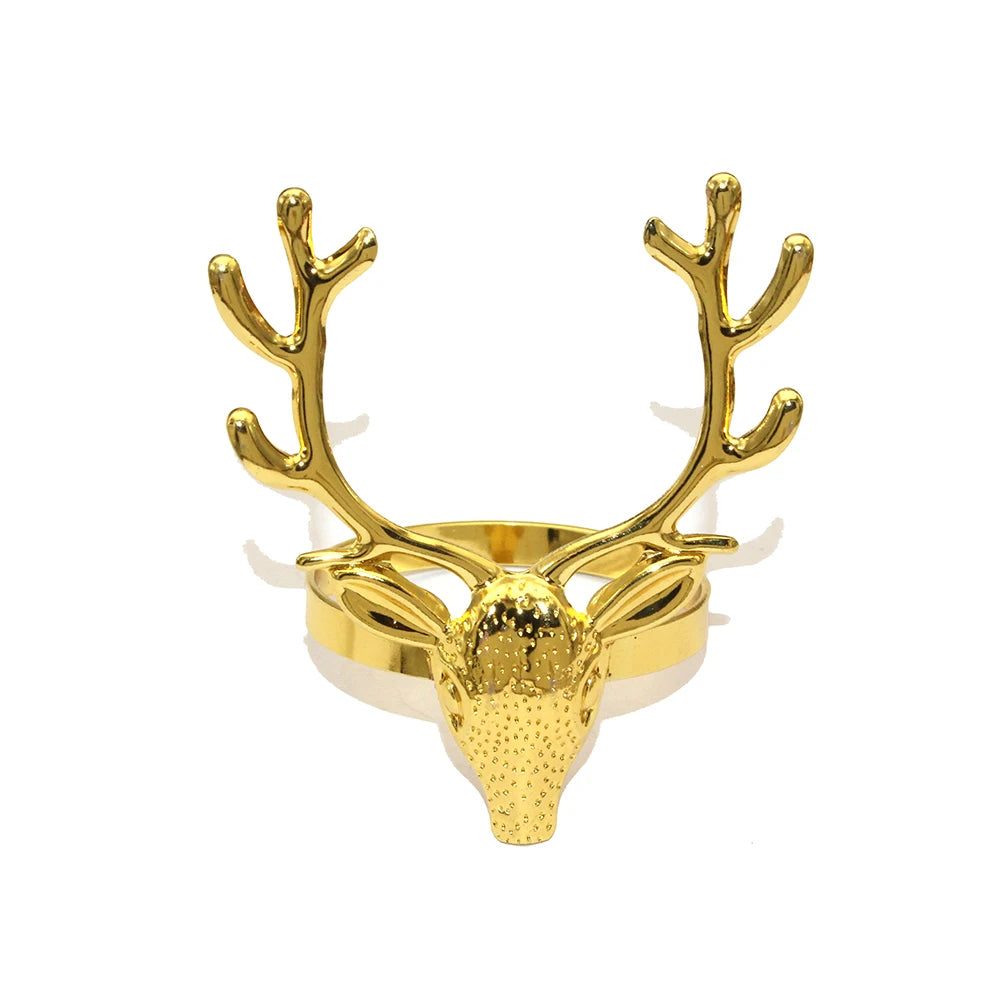 Gold deer head ring on a white background