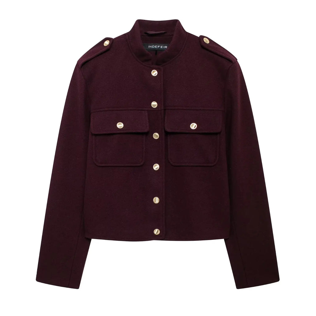 Maroon jacket with gold buttons on a white background