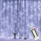 String lights with remote control in front of a curtain