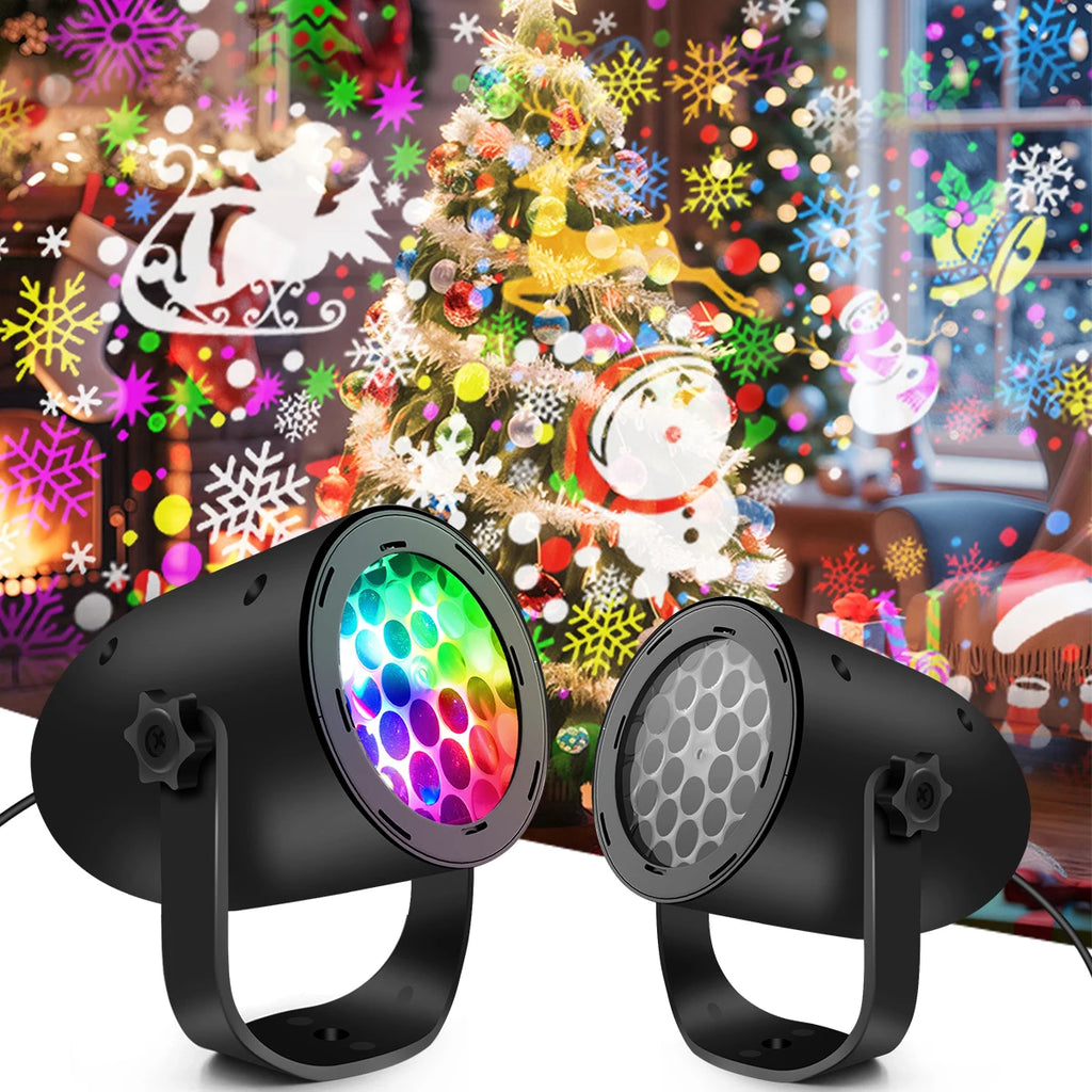 Two black LED projectors with colorful lights in front of a decorated Christmas tree.