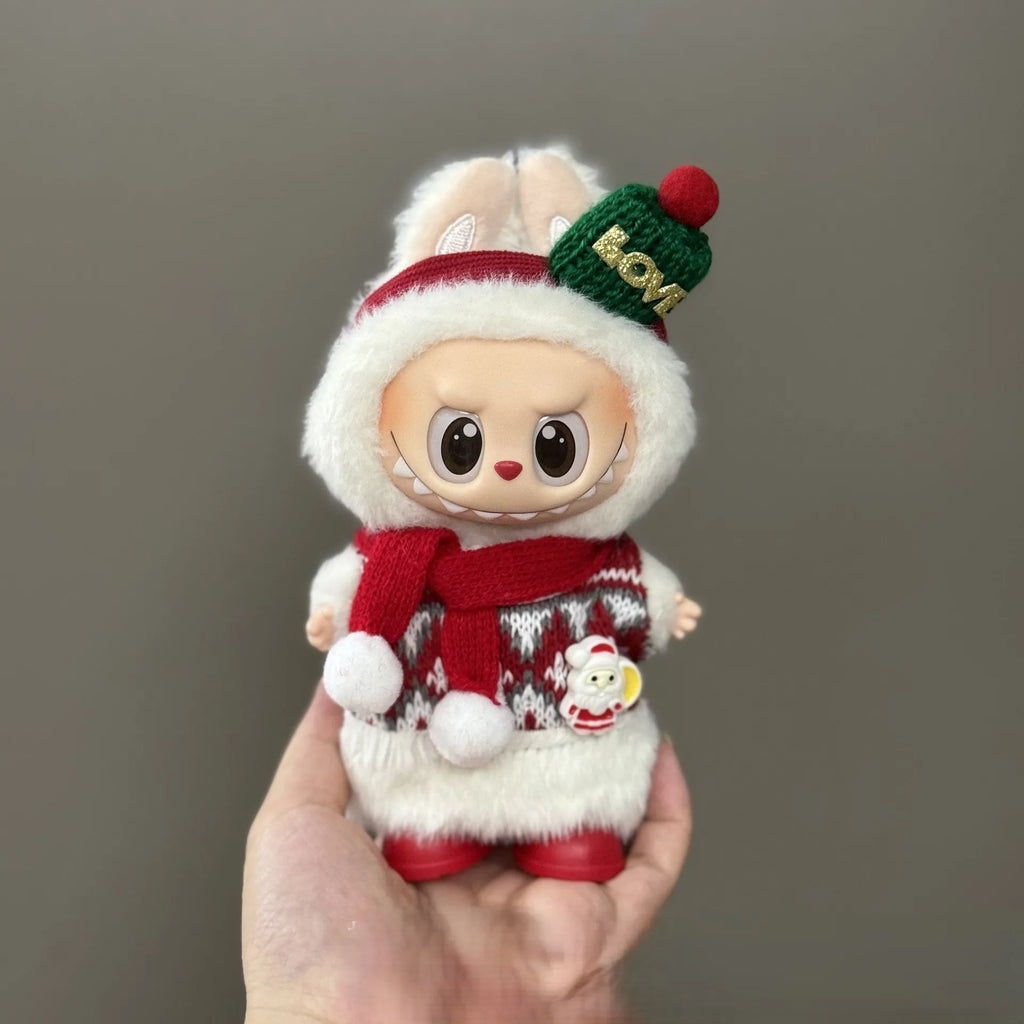 Toy figure in a festive outfit with a gray background
