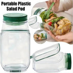 Portable plastic salad pod with green lid, showing a salad inside, and a person holding it.