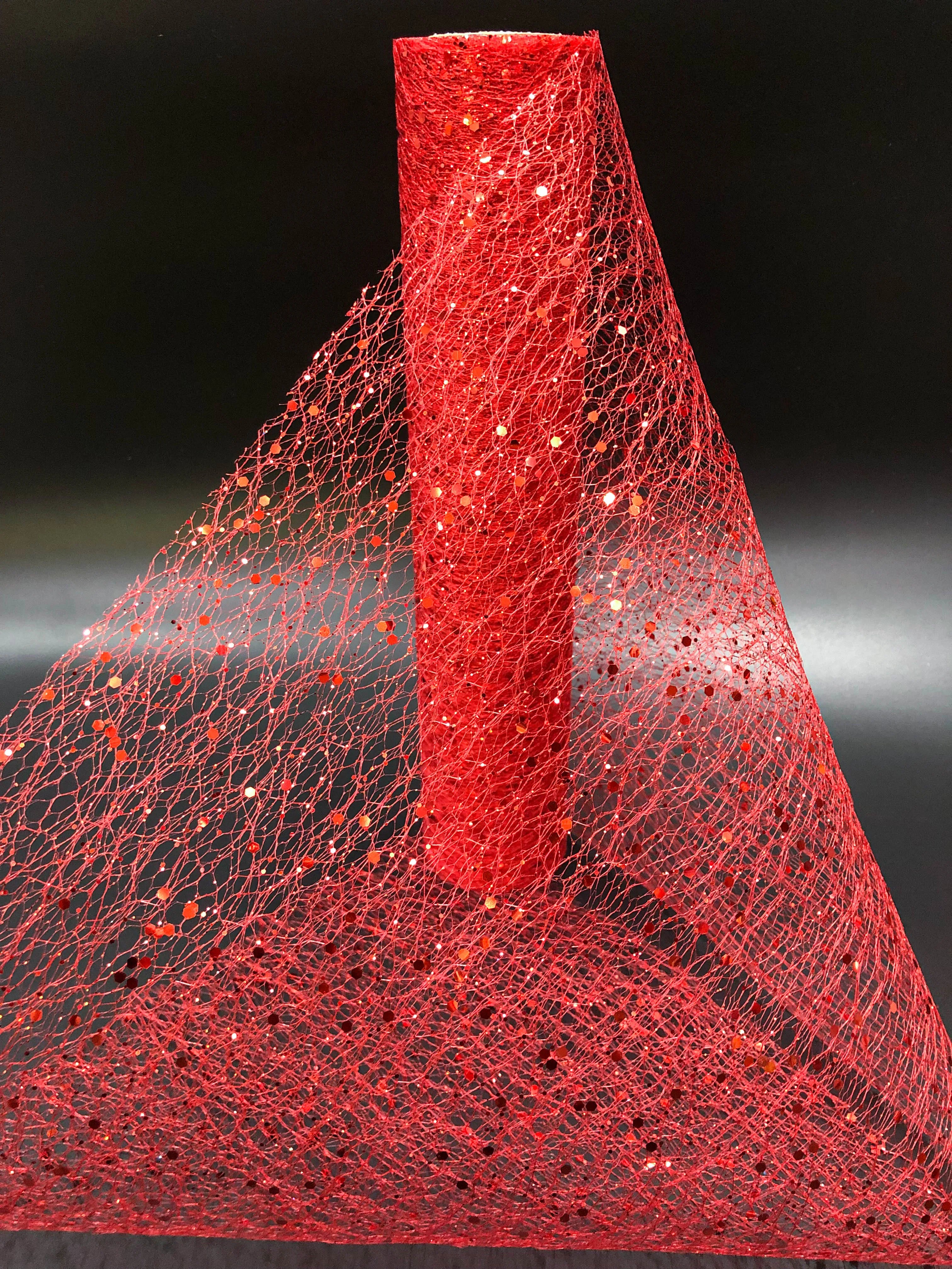 Red glittery mesh fabric on a black background