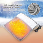 Heating pad with USB cable on a snowy background, highlighting high-quality flannel composite fabric.