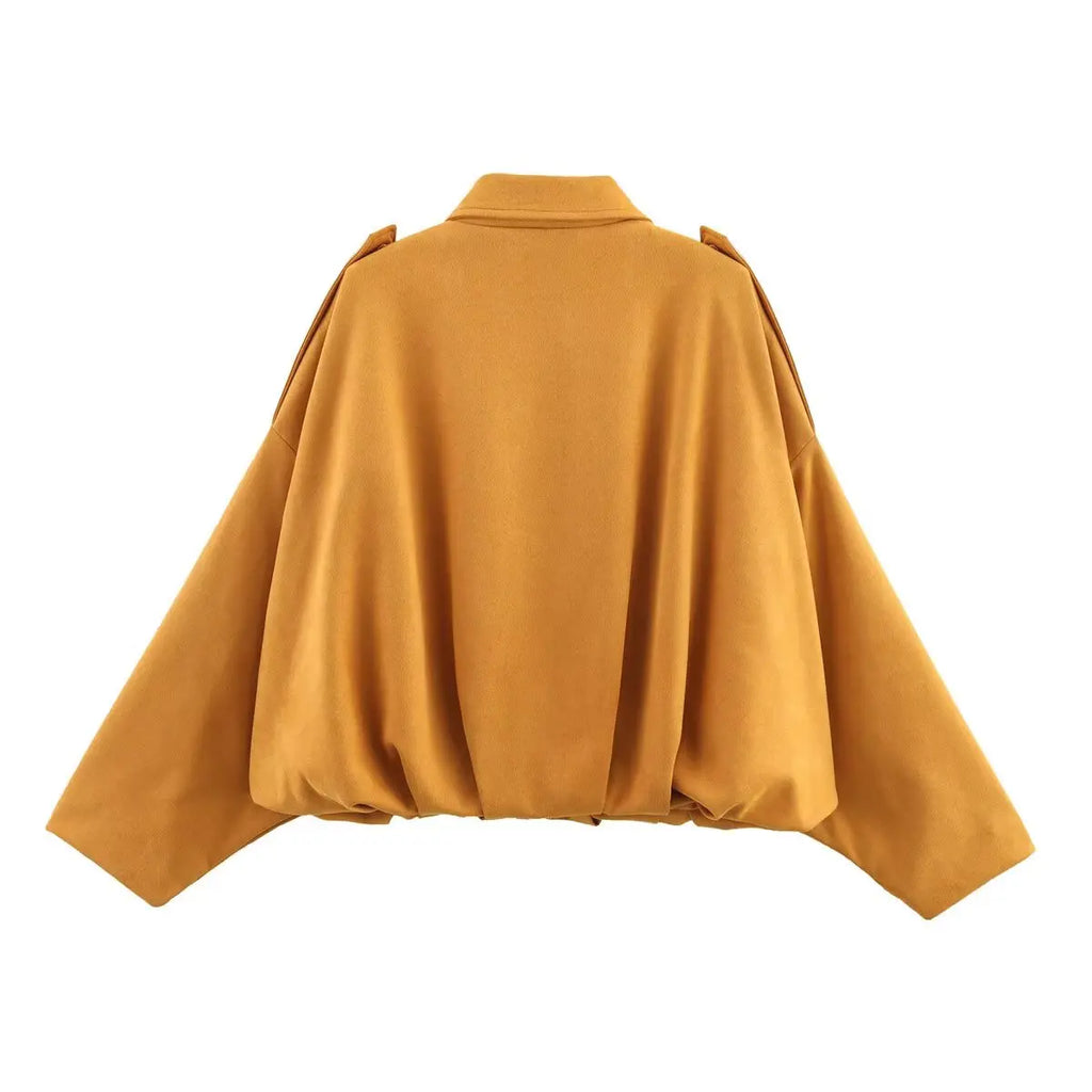 Yellow cape on a white background