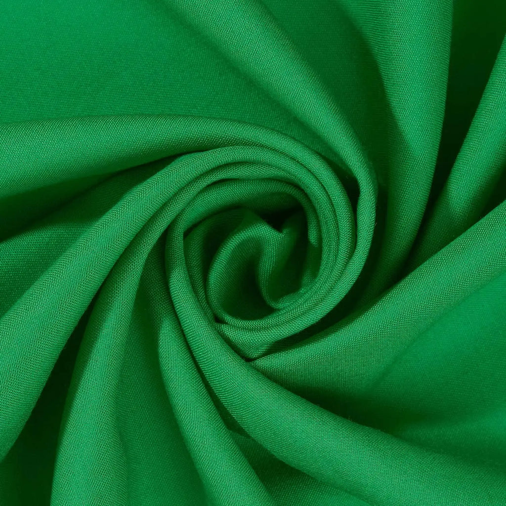 Close-up of green fabric with folds