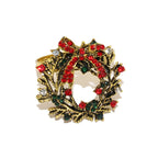Gold wreath brooch with red and green gemstones on a white background