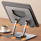 Tablet stand with adjustable angles on a wooden surface with a cup of coffee.