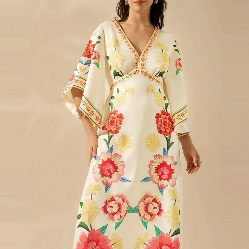 Woman wearing a floral dress with a beige background