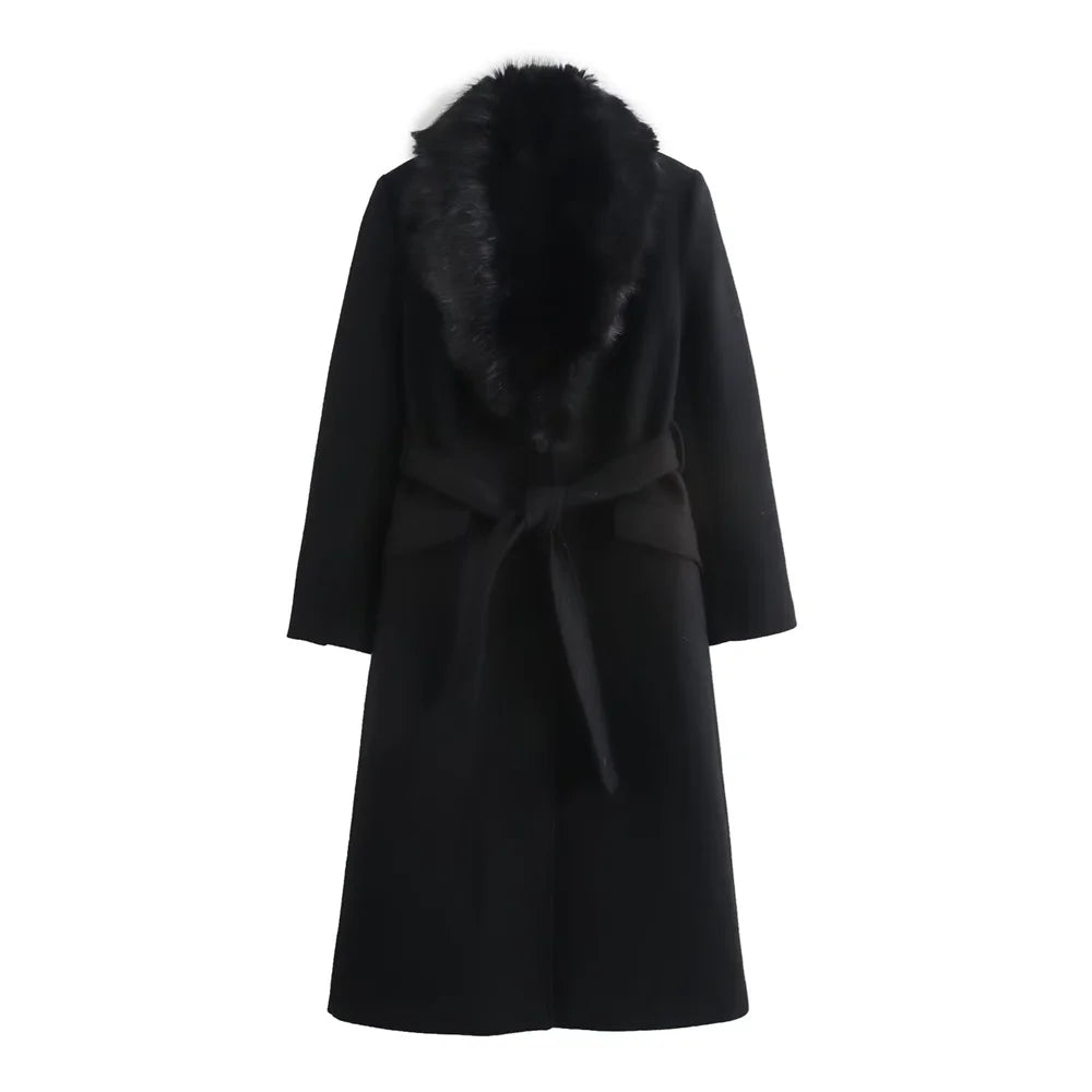 Black coat with fur collar on a white background
