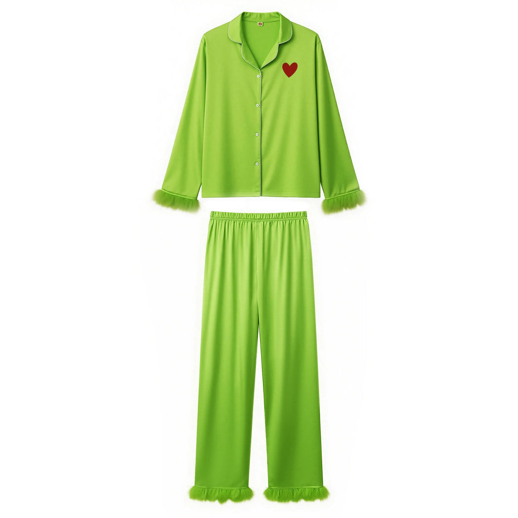 Green pajama set with a red heart on the chest against a white background