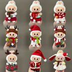 Set of Christmas-themed plush toys on a gray background