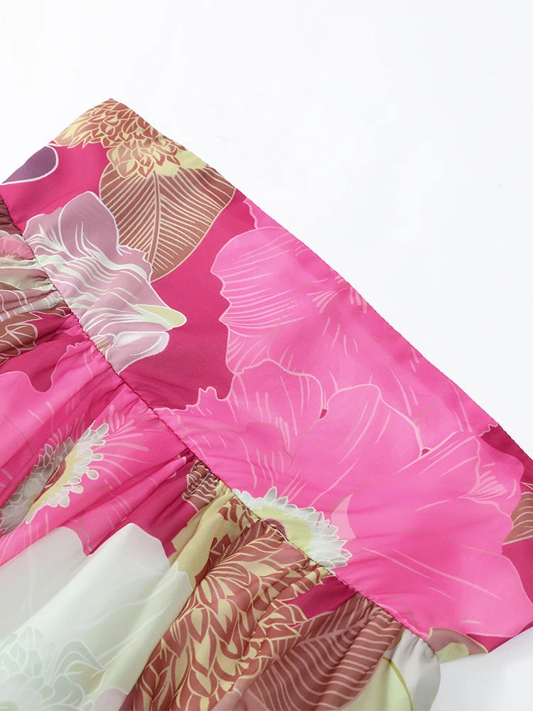 Close-up of a pink floral fabric with a white background