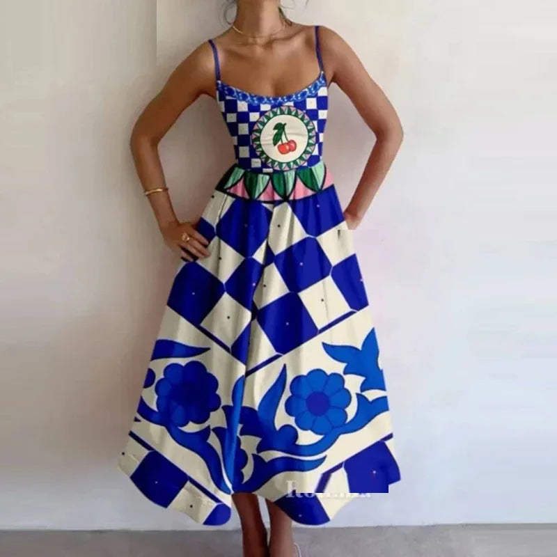 Woman wearing a colorful dress with a geometric pattern on a plain background