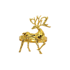 Gold deer-shaped ring on a white background