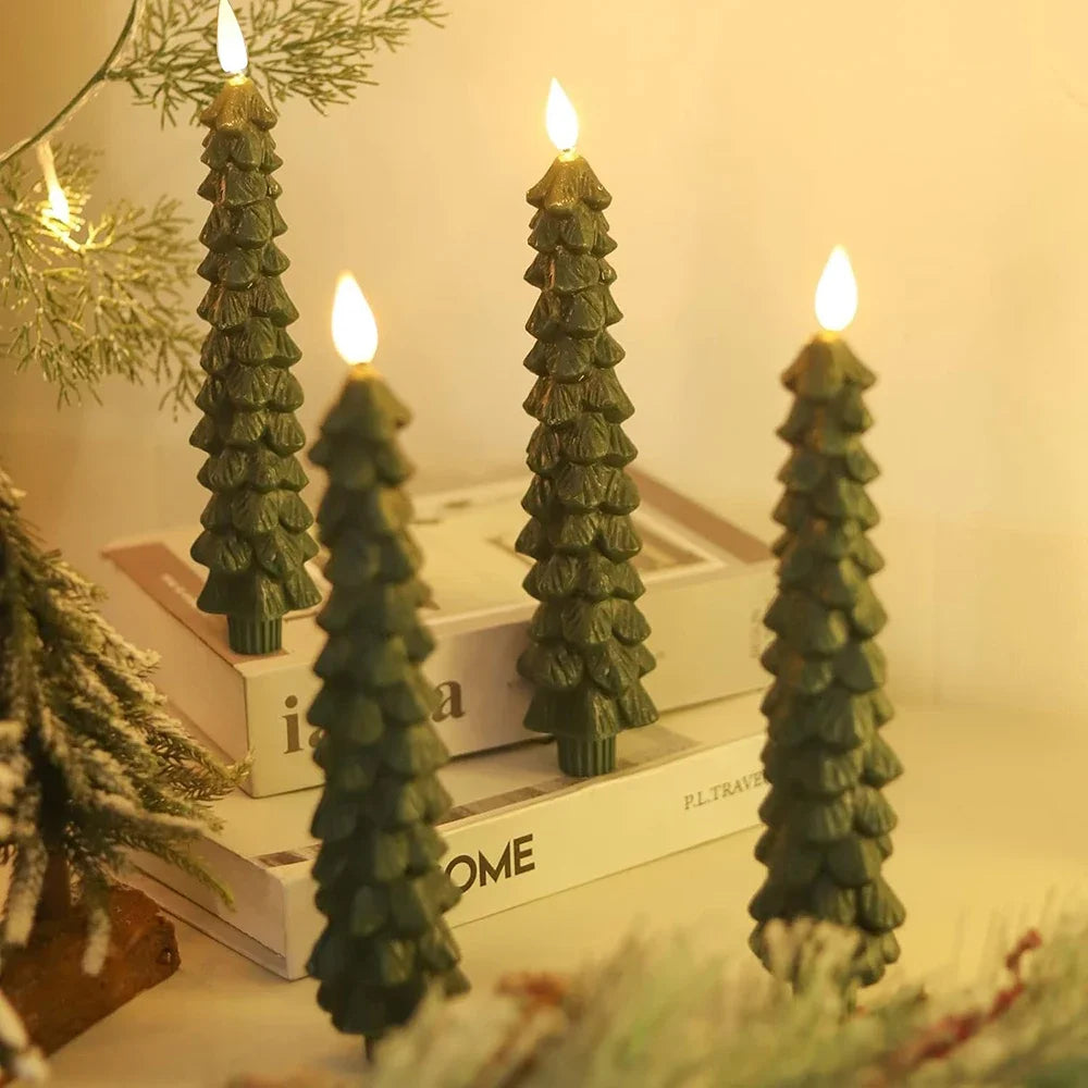 Green tree-shaped candles on a surface with a blurred background