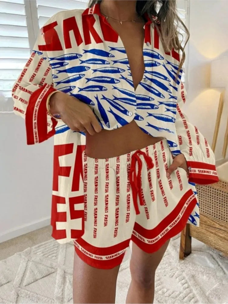 Person wearing a red, white, and blue outfit with text and fish pattern.