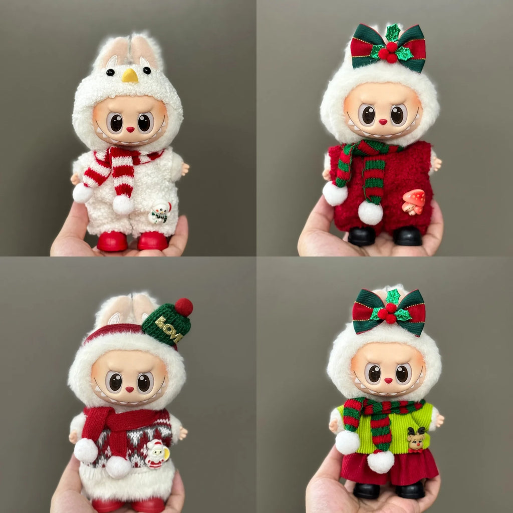 Four different outfits of a plush toy held in a hand against a gray background