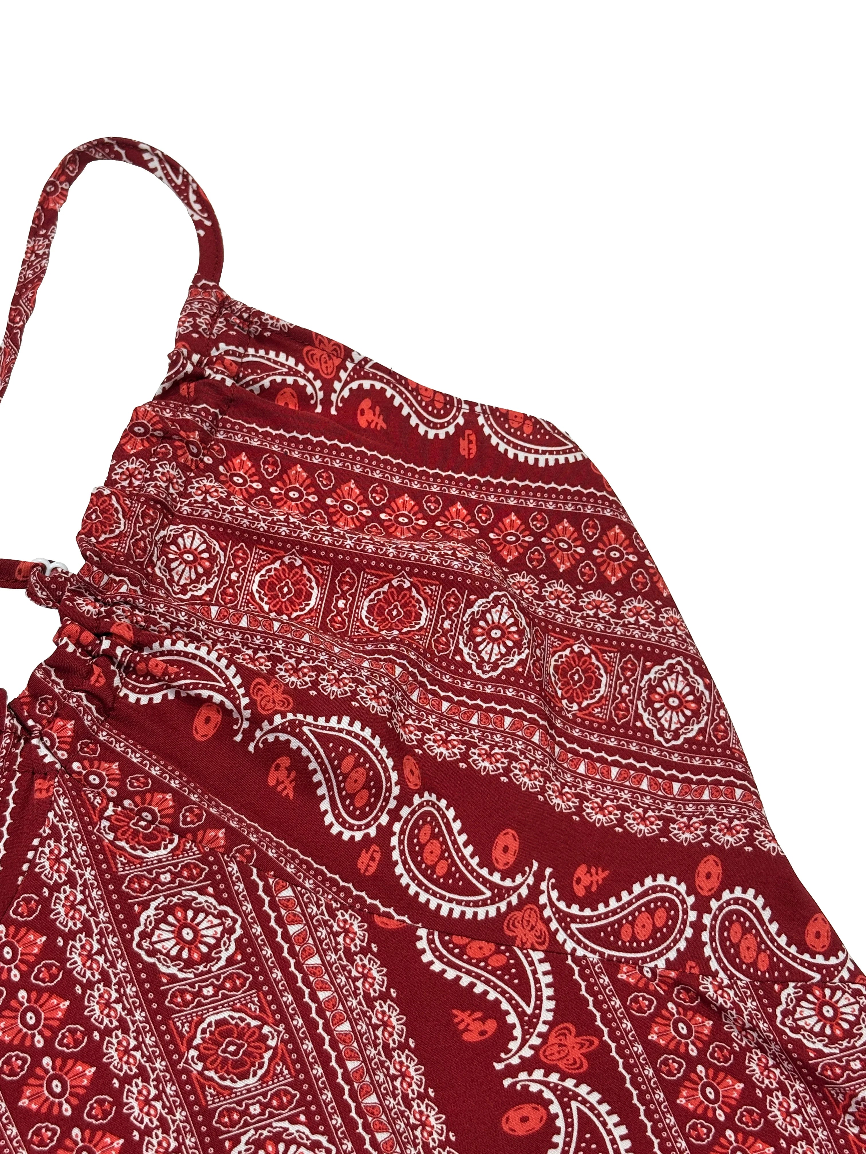 Red and white patterned apron on a white background