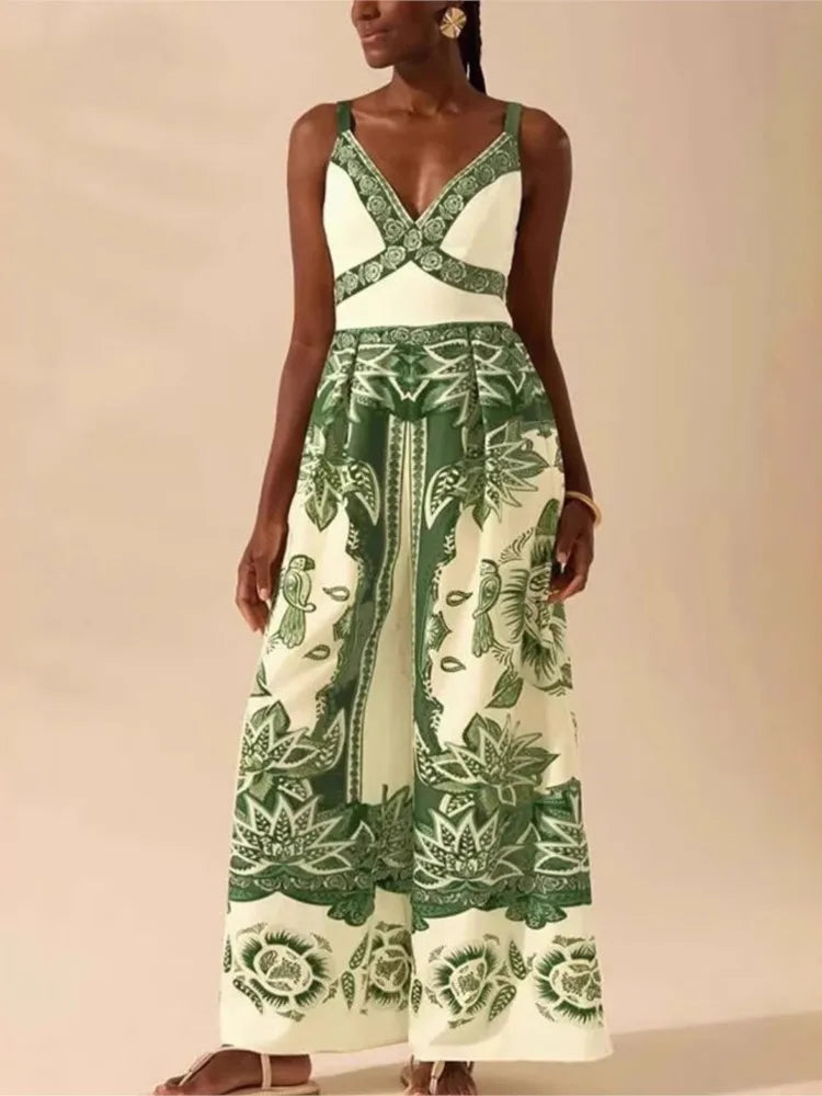 Woman wearing a green and white patterned jumpsuit on a beige background