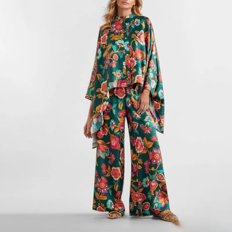 Woman wearing a floral jumpsuit on a white background