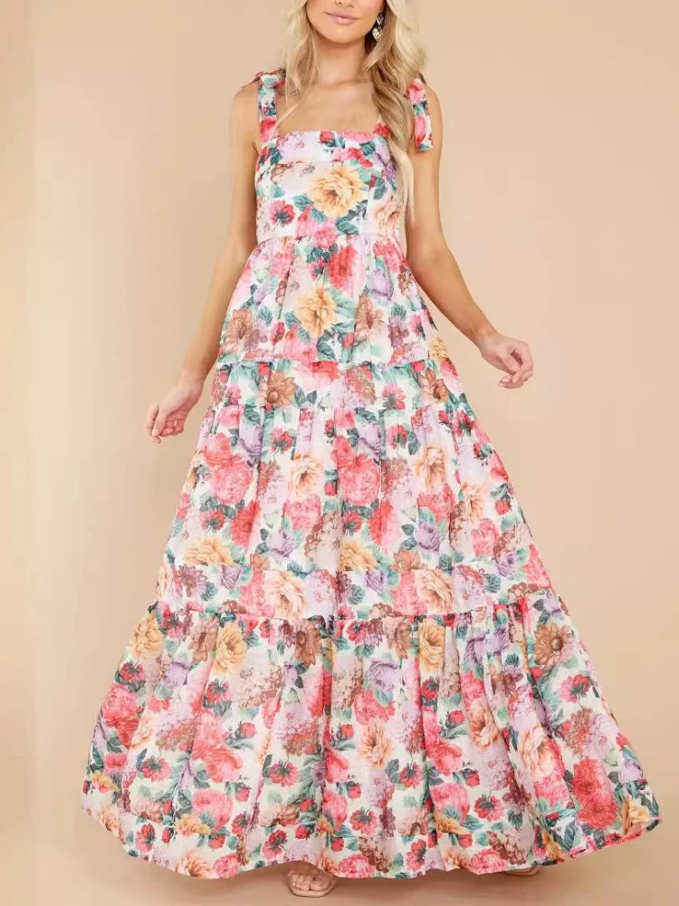 Woman wearing a floral dress on a beige background