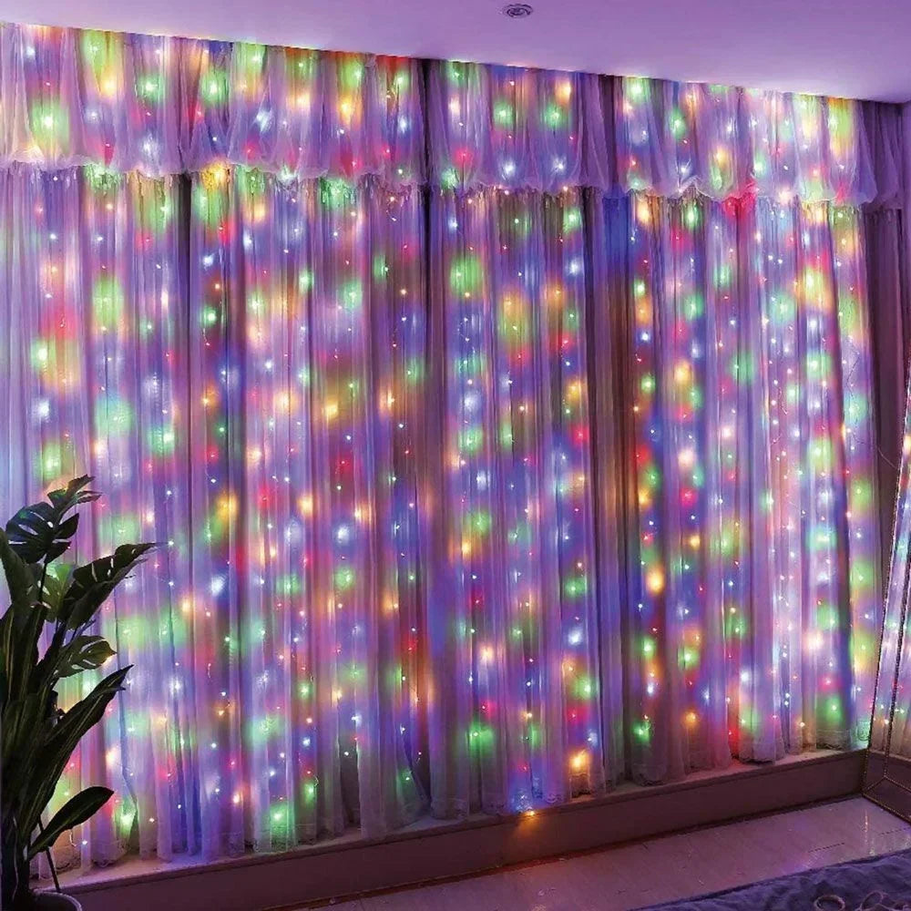 Decorative string lights on a curtain with a plant and floor lamp in the foreground.