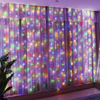 Decorative string lights on a curtain with a plant and floor lamp in the foreground.