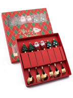 Set of Christmas-themed mini gold forks and spoons in a decorative box.