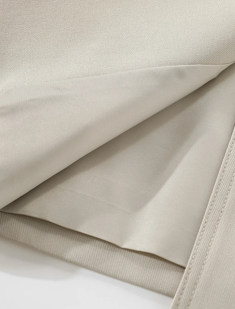Close-up of beige fabric with a subtle texture
