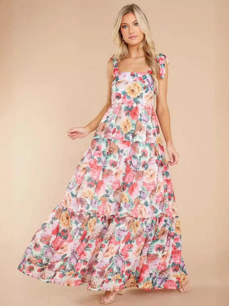 Woman wearing a floral dress on a beige background