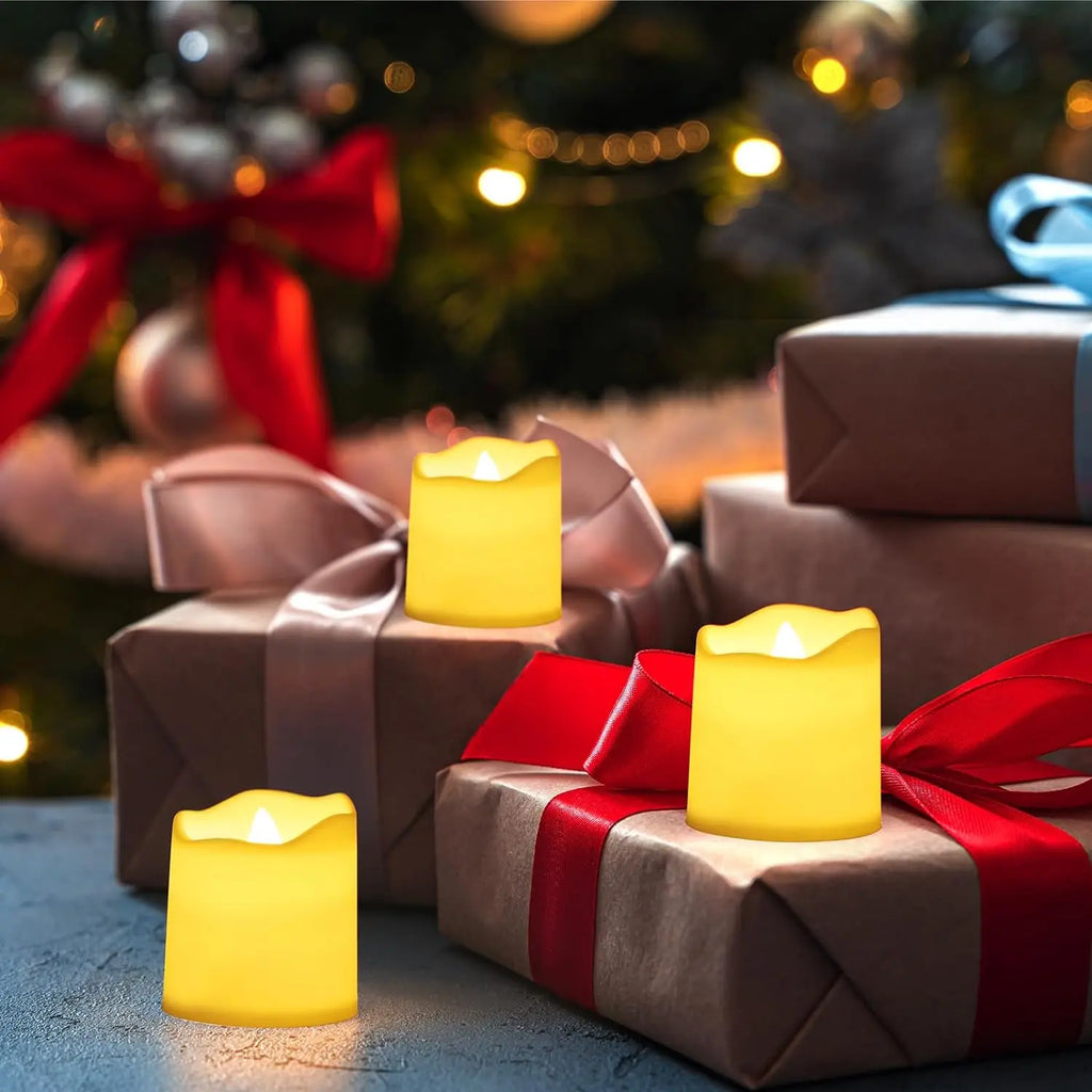 Decorative candles on wrapped presents with a festive background