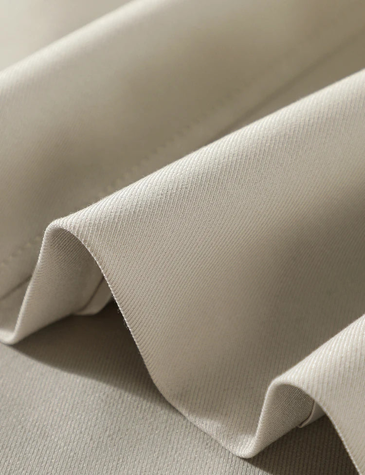 Close-up of beige fabric with a subtle texture