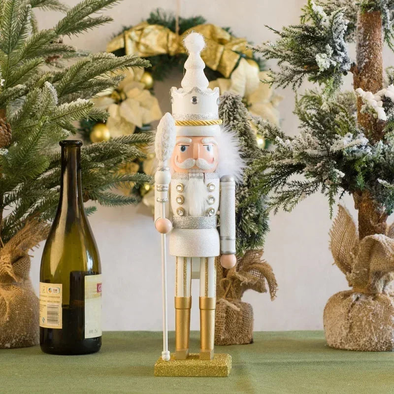Decorative nutcracker figure in a festive setting with Christmas trees and a bottle of wine.