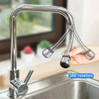 Chrome kitchen faucet with a flexible hose attachment on a sink.