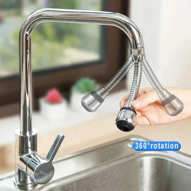 Chrome kitchen faucet with a flexible hose attachment on a sink.