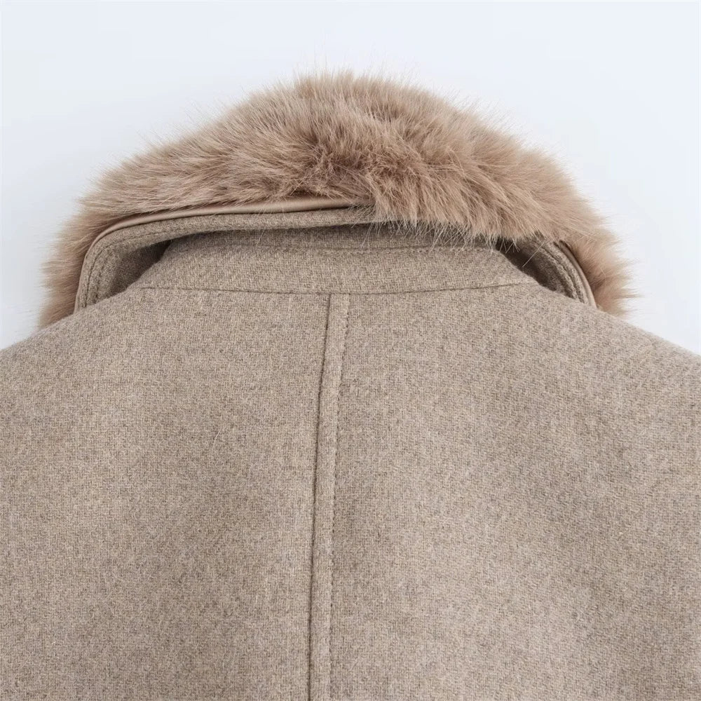 Beige coat with fur collar on a white background