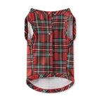 Red and green plaid dog coat on a white background