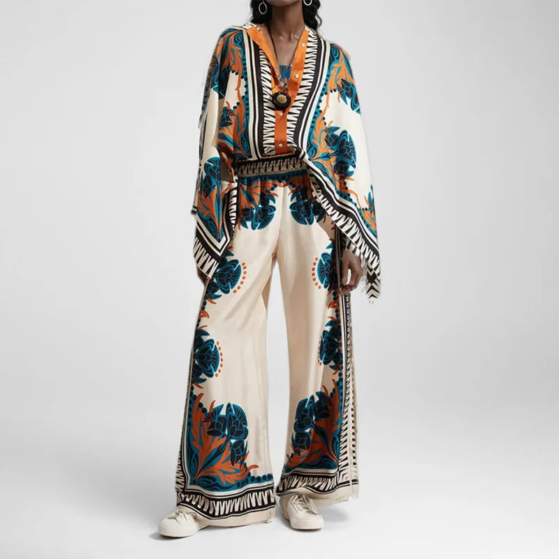 Person wearing a colorful patterned outfit on a white background