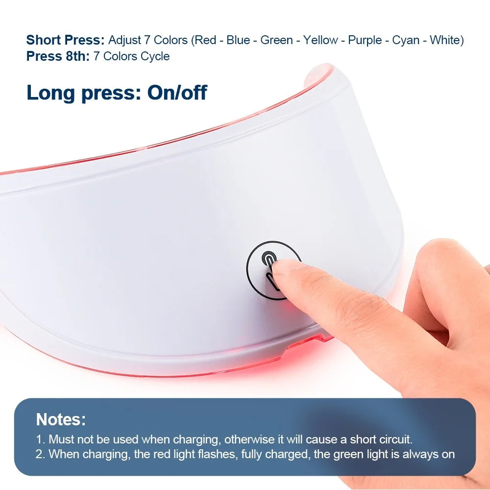 Hand pressing a button on a white device with text explaining color adjustment and power control.