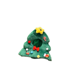 Green plush toy shaped like a Christmas tree with colorful decorations on a white background