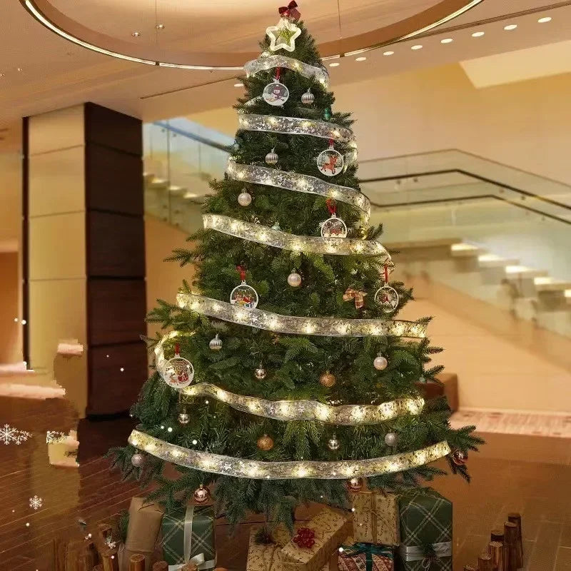 Decorated Christmas tree with lights and ornaments in a shopping mall setting