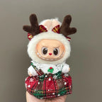 Toy reindeer with a white beard and red antlers on a gray background
